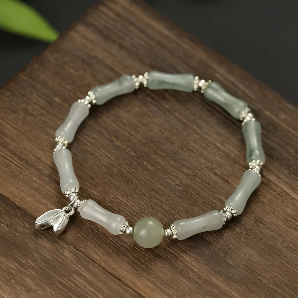 Handcrafted antique style sterling silver bracelet with Tianshan green bamboo centrepiece for women.