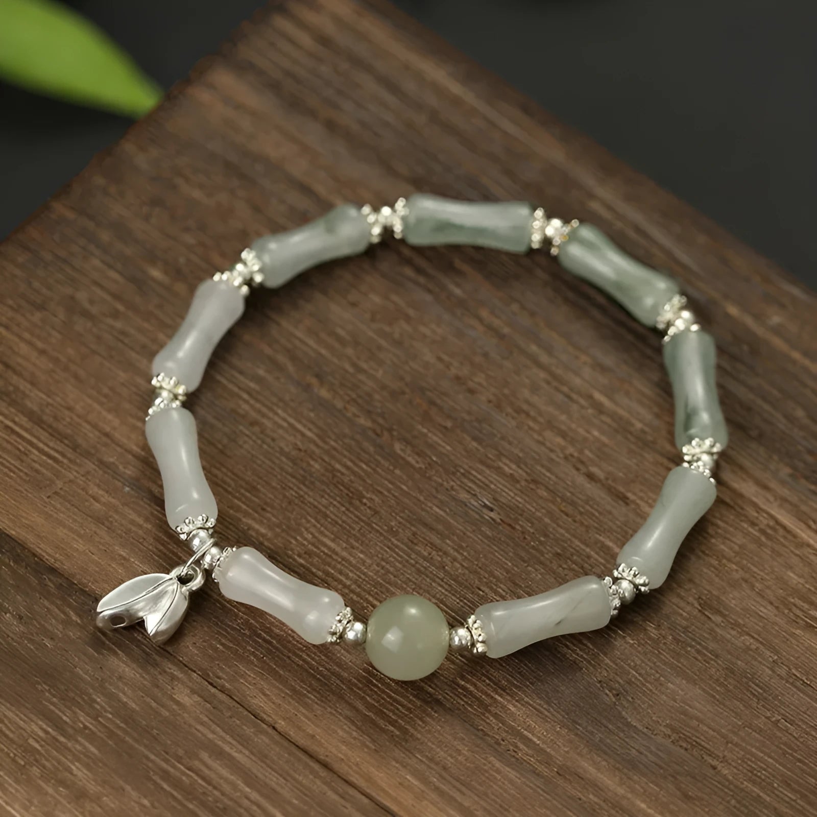 Handcrafted antique style sterling silver bracelet with Tianshan green bamboo centrepiece for women.