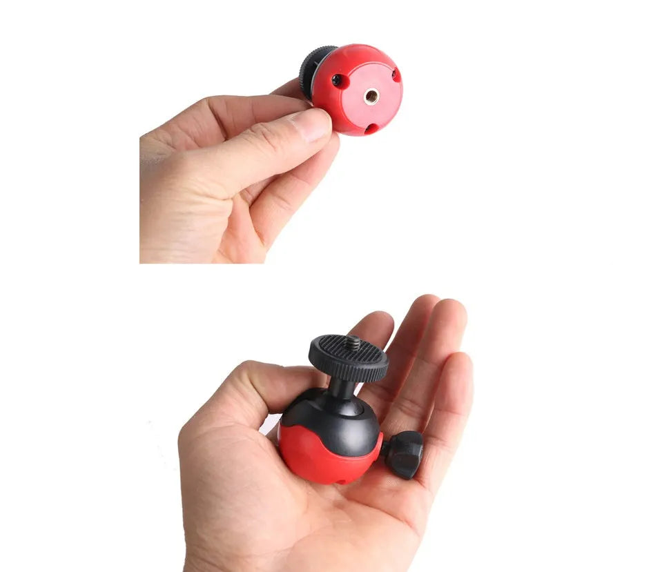 Black flexible octopus tripod with wrapped legs and spherical gimbal head for mounting a smartphone