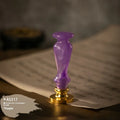 Wooden wax seal handle with brass fittings shown in a selection of different styles and colour finishes.