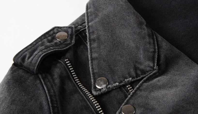 Black denim jacket with lapel collar, zip placket, long sleeves and zipper pockets, slim fit