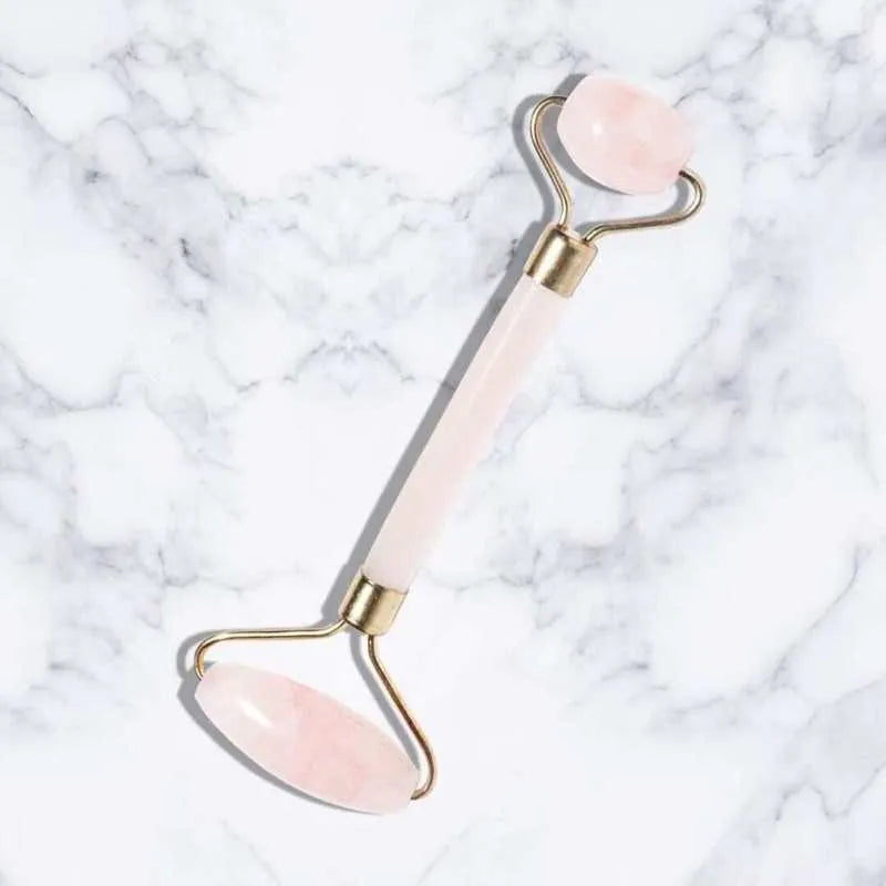 Jade roller massager with rose quartz gua sha stone, dual-sided natural jade facial tool for tension relief and skincare absorption.