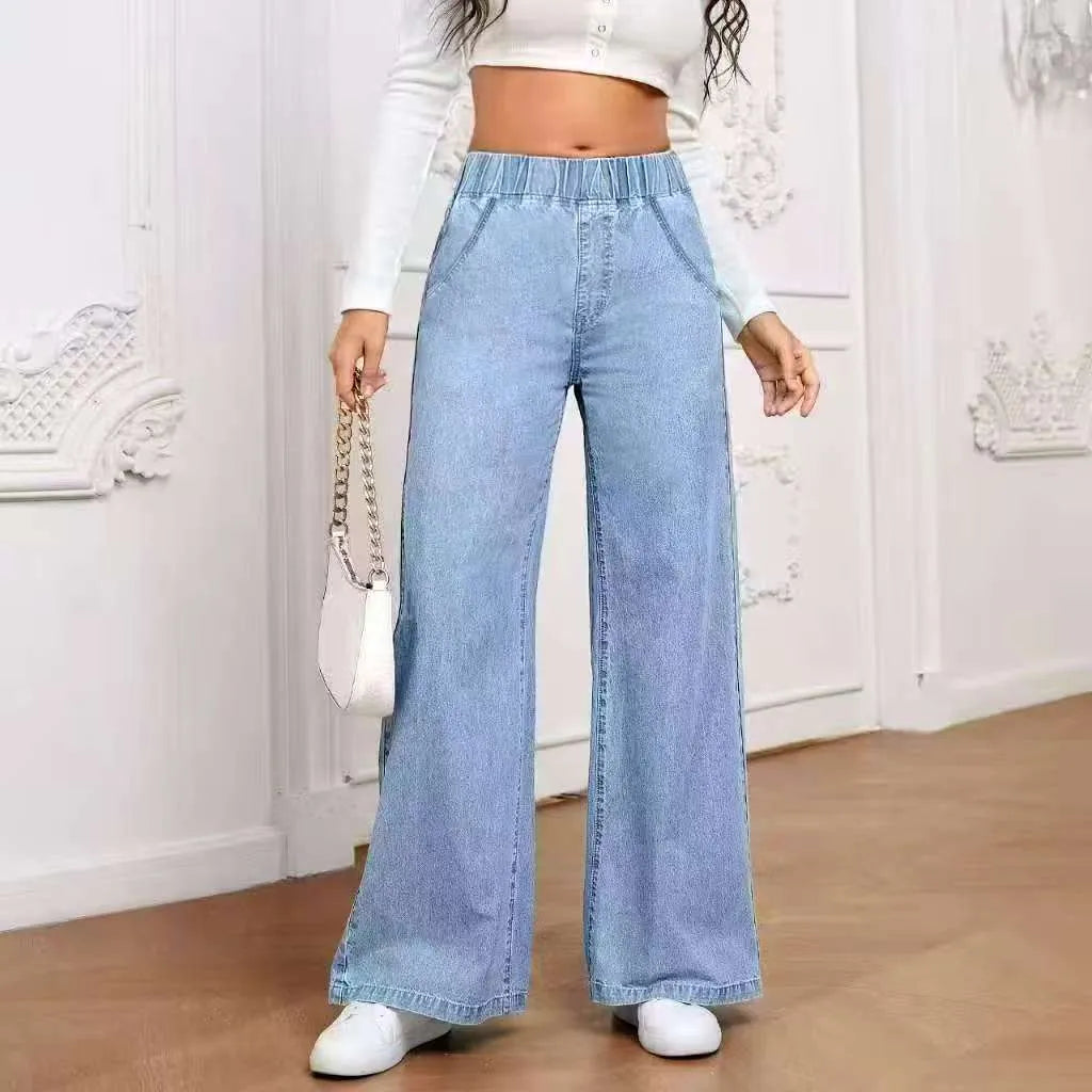 Light blue washed wide-leg plus size straight jeans with mid waist zip fly