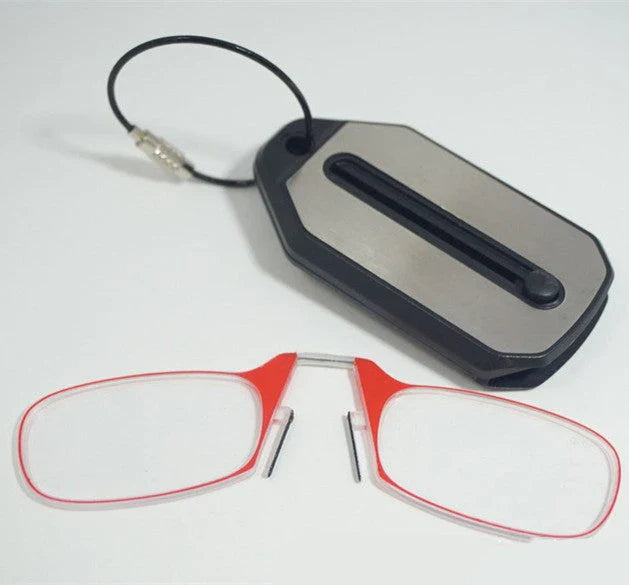 Compact magnetic reading glasses with rimless frames and adjustable nose clip