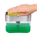 A grey automatic touch-free soap dispenser for the kitchen on a worktop.