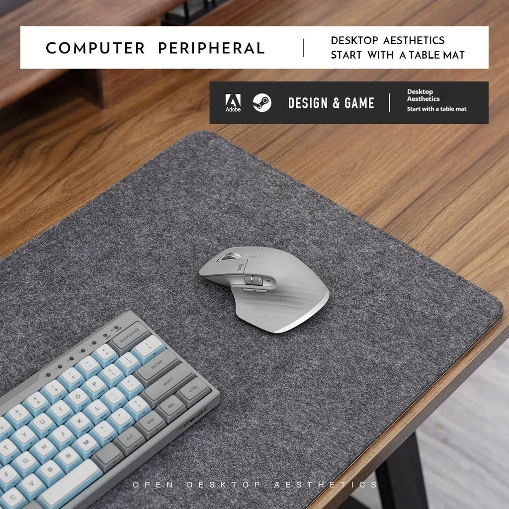 A grey and black felt cork desk mat with a mouse on it, shown on a wooden desk.