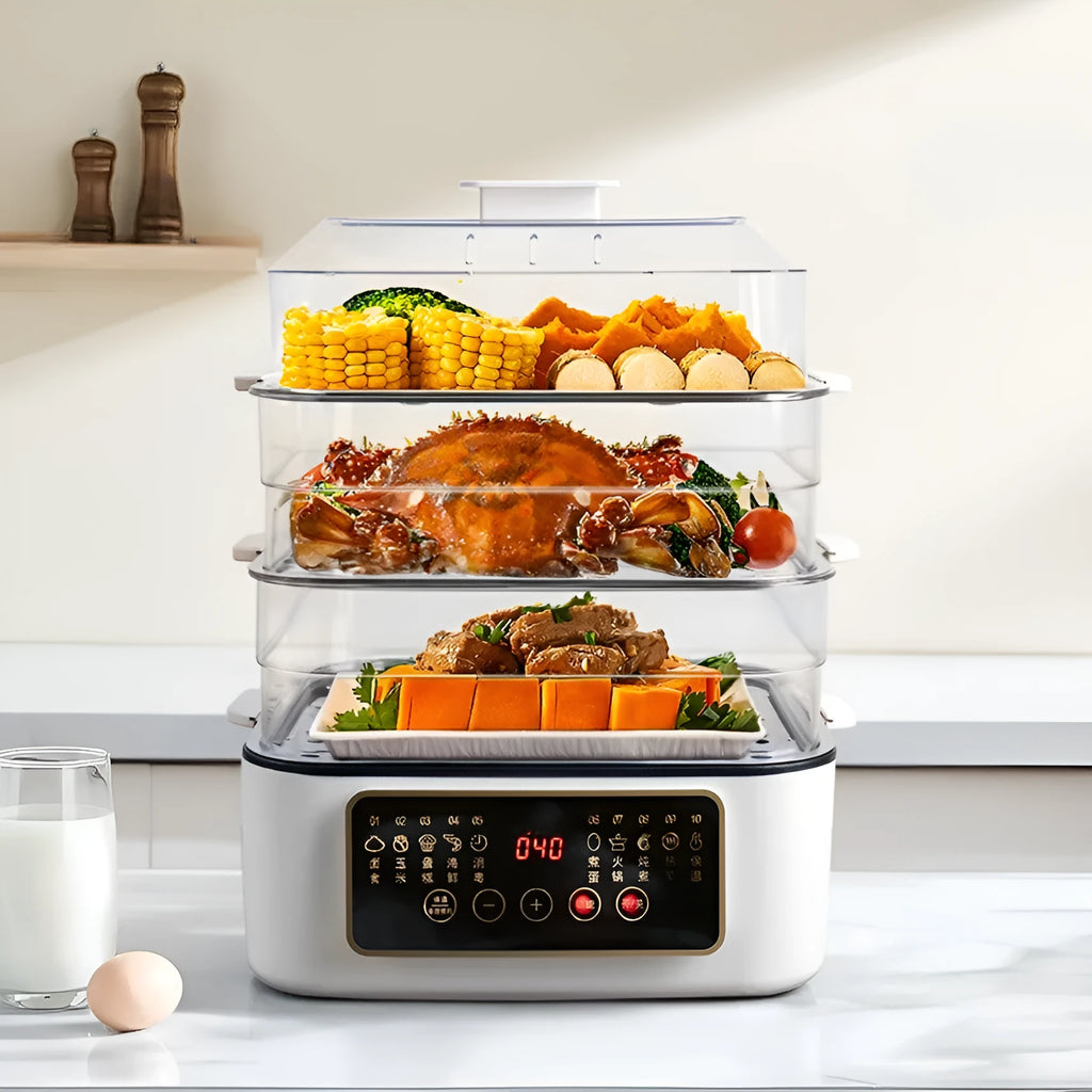 Stainless steel electric food steamer with digital display and steaming rack on a kitchen counter.