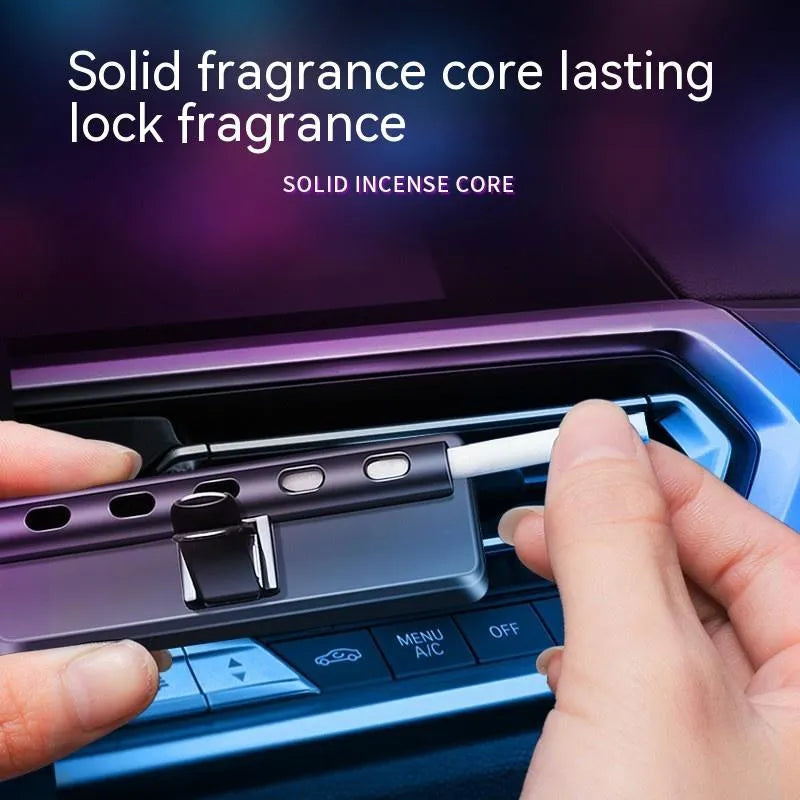 Black car air vent aromatherapy unit with LED lights and fragrance stick slot