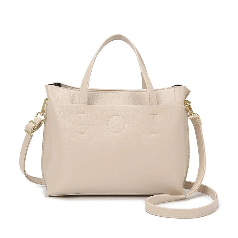 Large capacity multi-compartment soft surface PU tote bag in khaki with sewing thread details and single shoulder strap