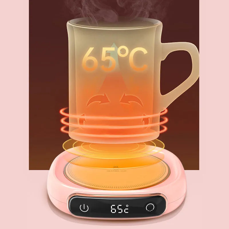White USB-powered coffee mug warmer on desk heating a ceramic coffee cup