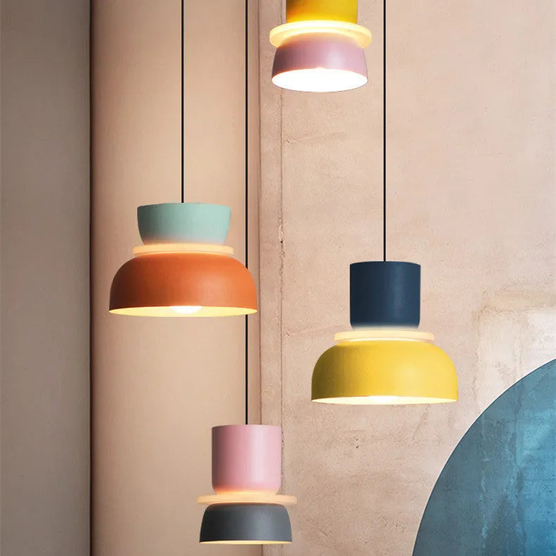 Nordic minimalist iron pendant light with a long fabric cable in a colour-matched finish.