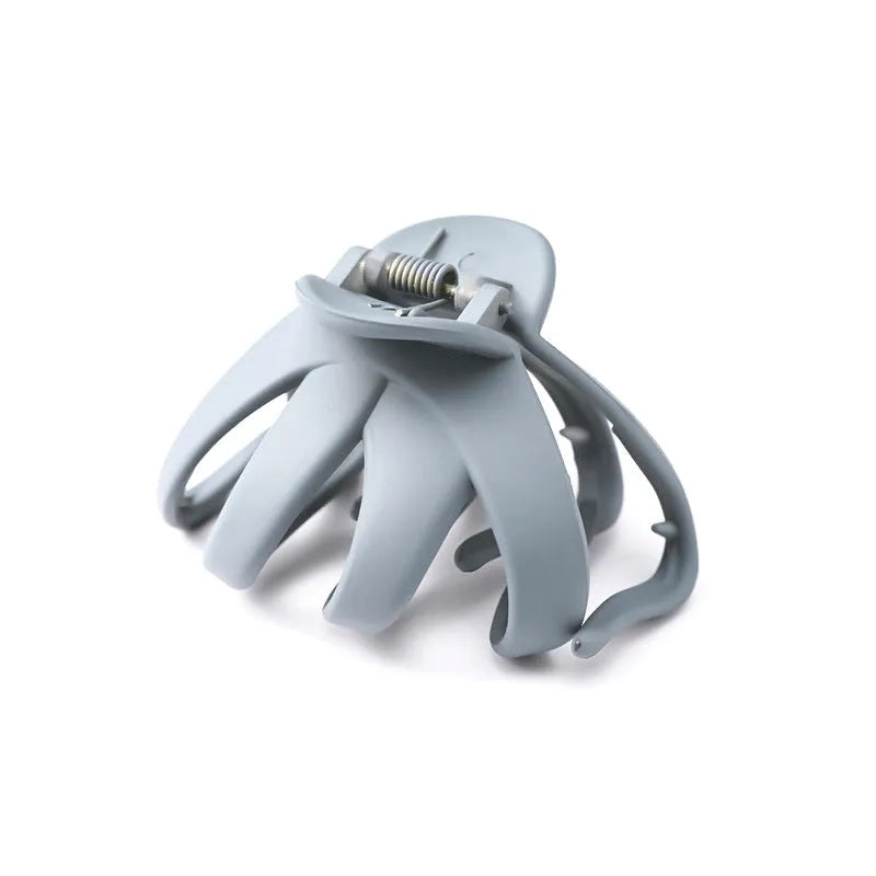 Children's hair clips in small and large sizes, shown in six colours including green, dark blue, wine red, black, dark pink, and blue grey.