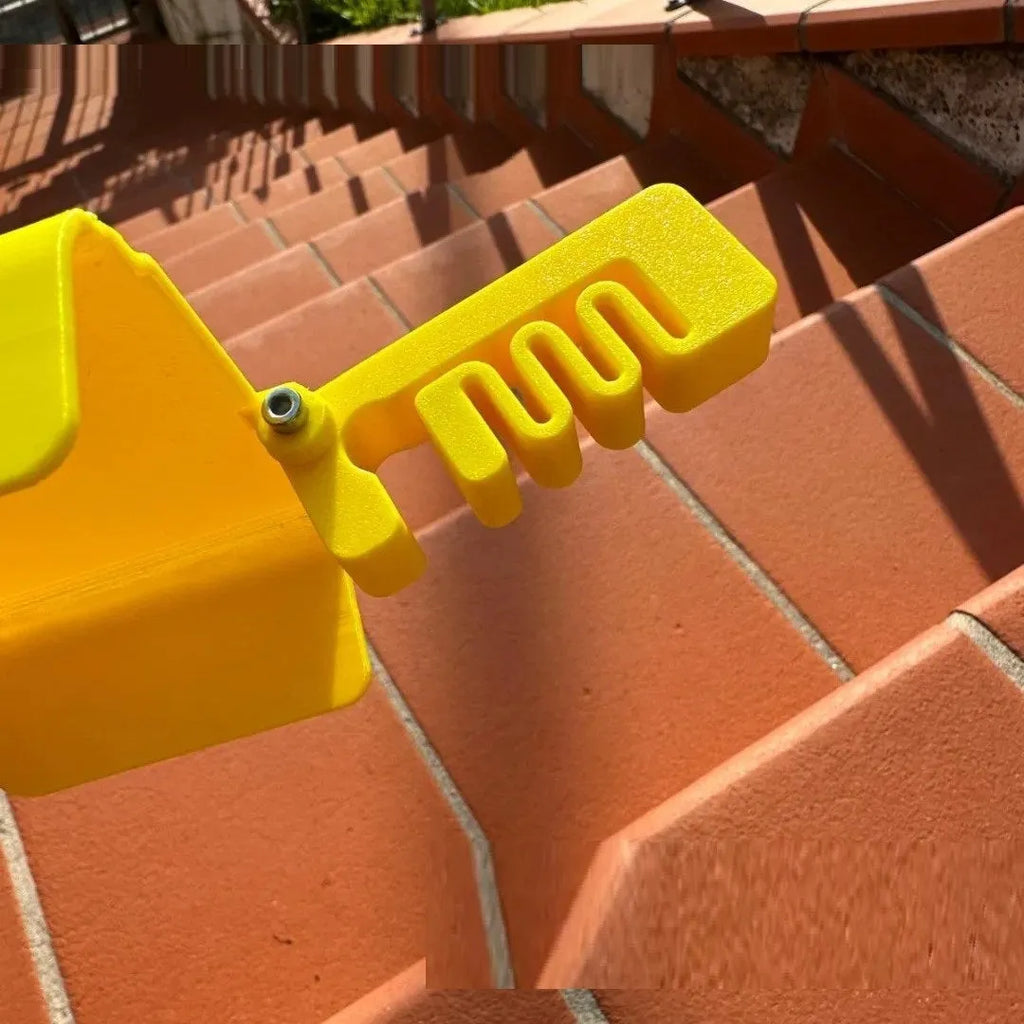 Yellow foldable plastic phone sunshade holder with phone clip for beach use.