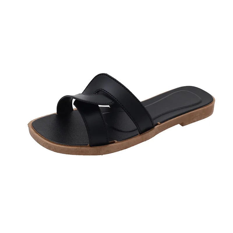Women's cross strap PVC sandal in light blue with a toe ring and non-slip sole.