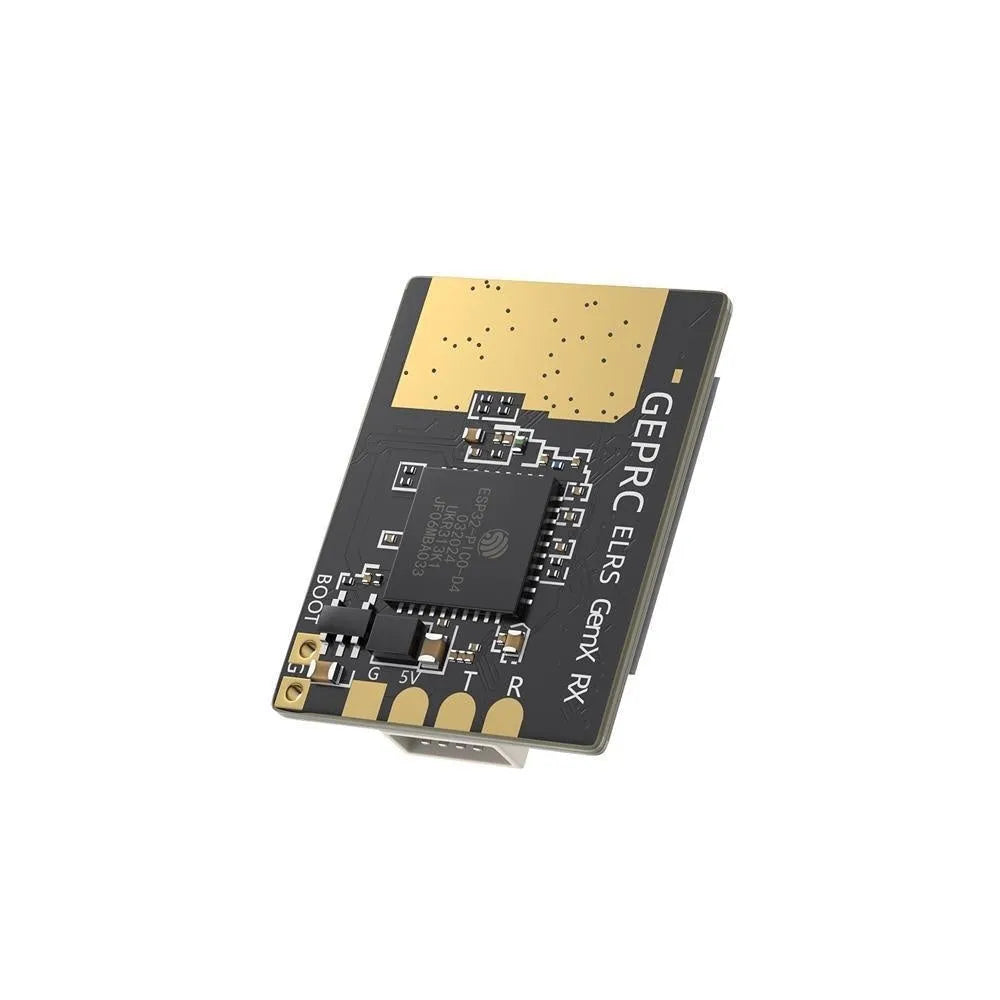 Gemini ELRS dual-frequency FPV receiver with two T-shaped antennas and installation accessories on a table.