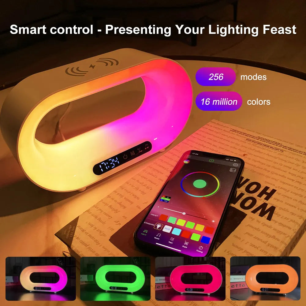 White multifunctional 3-in-1 LED night light with app control, RGB atmosphere lamp, wireless charger, and alarm clock on a desk