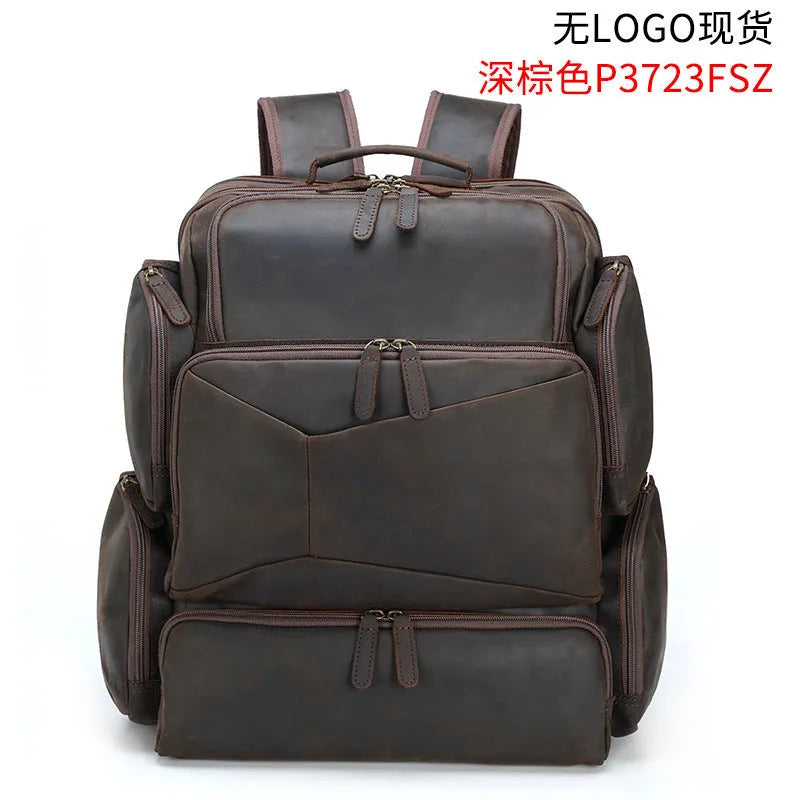 Dark brown retro leather backpack for men with a 17-inch laptop compartment open.
