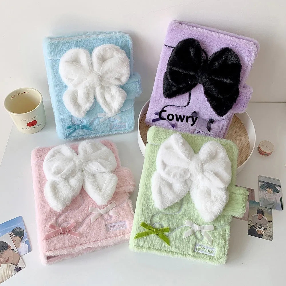 Pink plush bow A5 photo album with loose-leaf rings, open showing blank inner pages