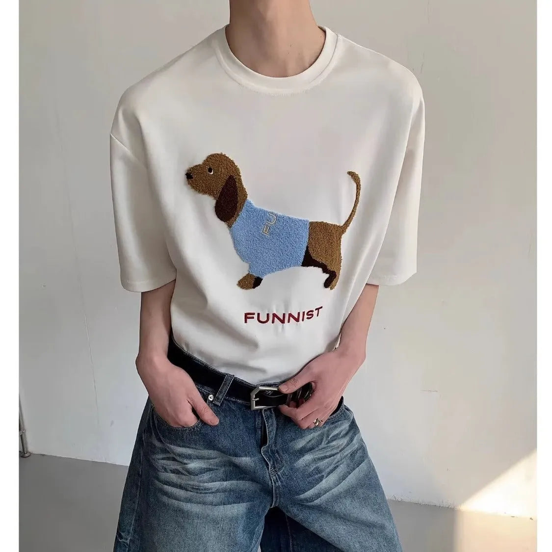 Grey cotton T-shirt for men with an embroidered sausage dog design on the chest.