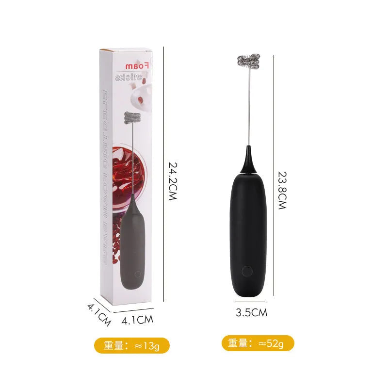 Hand-held electric milk frother and blender in black and white colour options on a kitchen counter.
