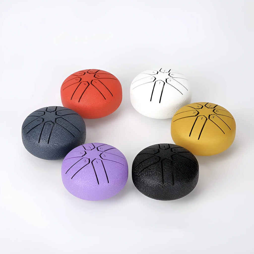3-inch carbon steel tongue drum with six tone tongues, available in multiple colours