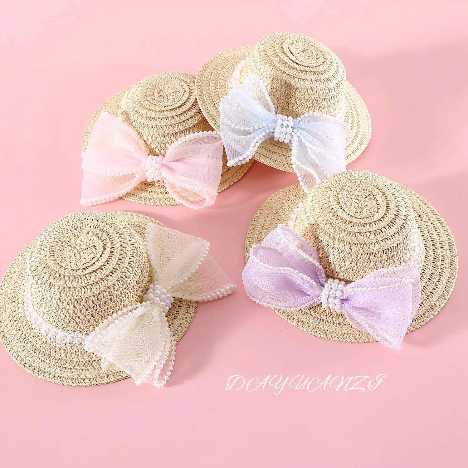 Woven Lafite leaf cat hat with pearl butterfly bow decoration in pink, purple, blue or white colours