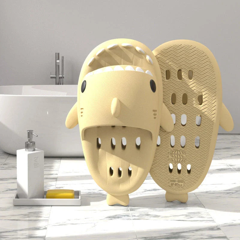 Shark-inspired shower slides with drain holes, featuring authentic shark design details and quick-drying EVA material