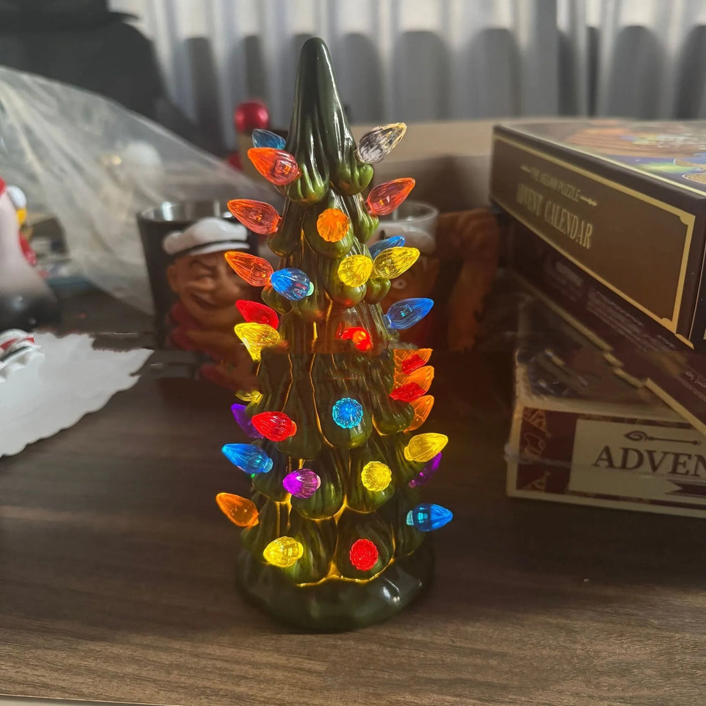 Resin Christmas tree ornament with coloured lights in European style, shown in 25cm size.