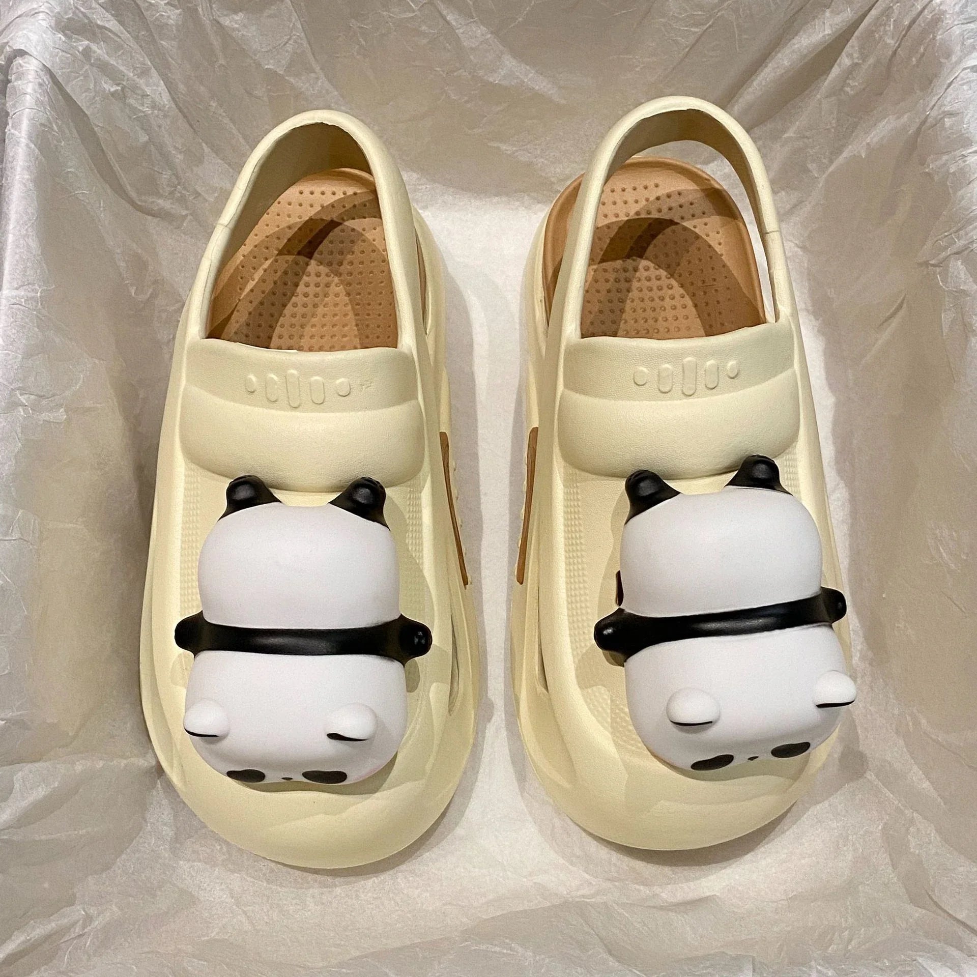 Adorable panda-themed slippers with LED lamp feature, offering cozy comfort and whimsical style for summer