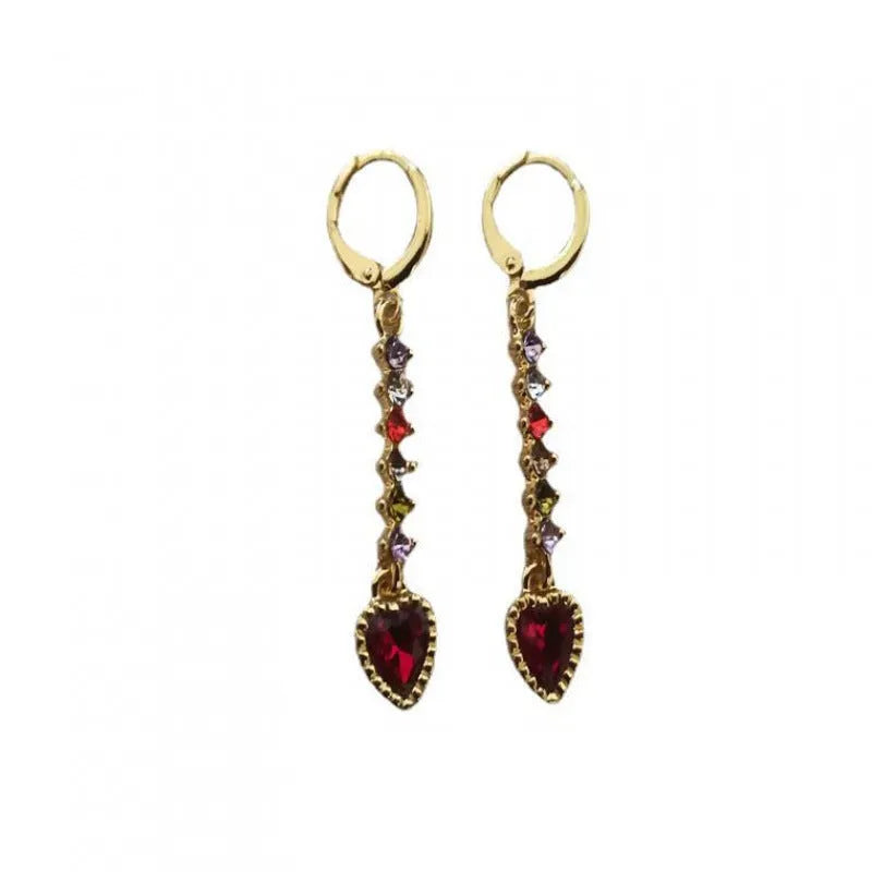 Heart-shaped alloy earrings for women in gold or silver tone with butterfly clasps