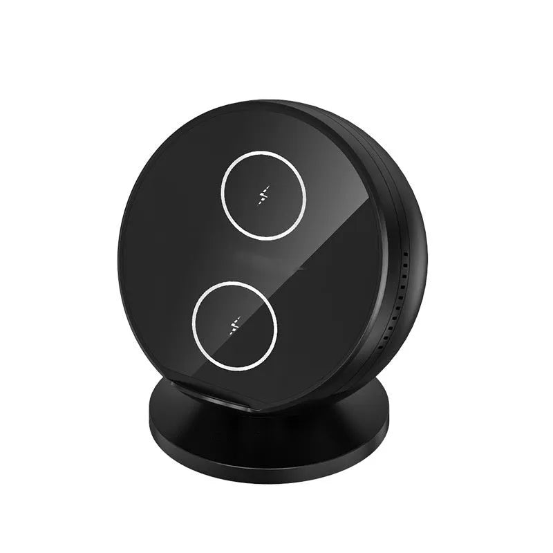 XC-11 black wireless charging phone holder with integrated Bluetooth speaker on a desk.