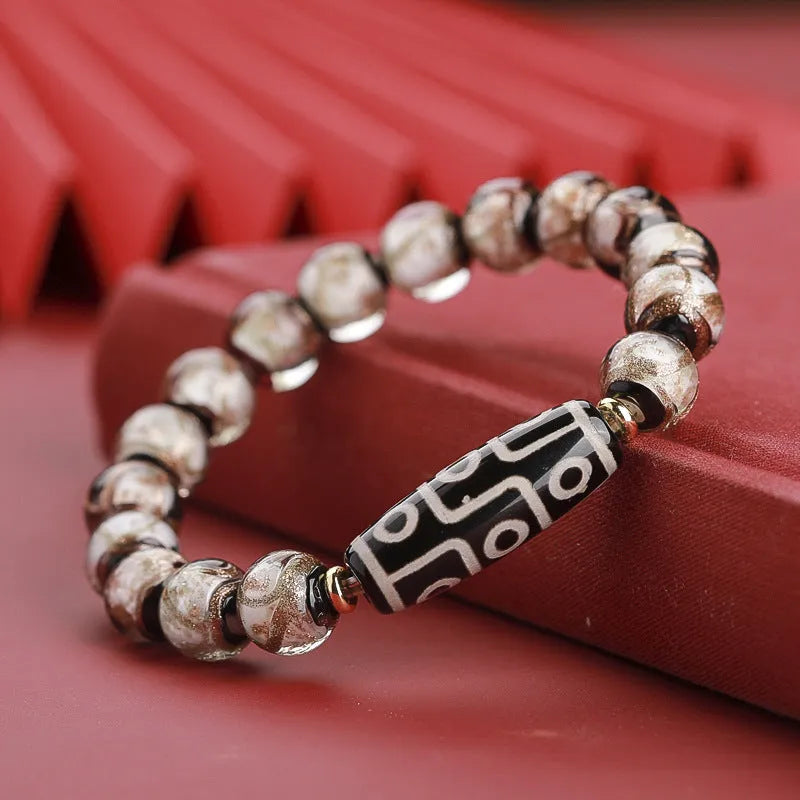 Chinese style bracelet with coloured glaze beads featuring snake patterns in 10mm, 12mm, and 14mm sizes