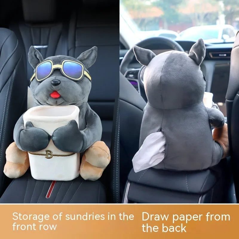 Plush car tissue box holder hanging in flip armrest compartment with dog character design