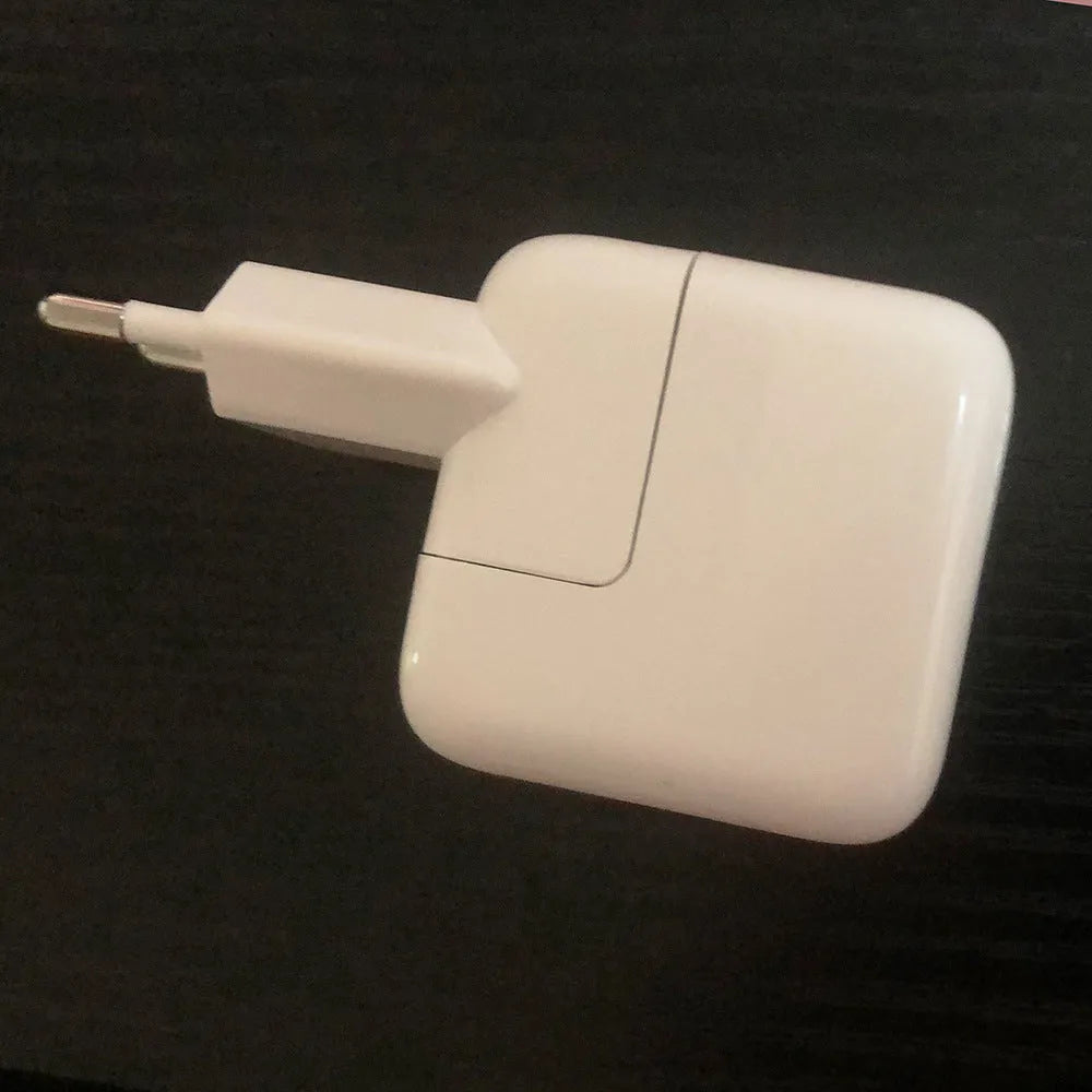 Apple-compatible iPad charger showing USB port with 10W/12W and US/EU plug options