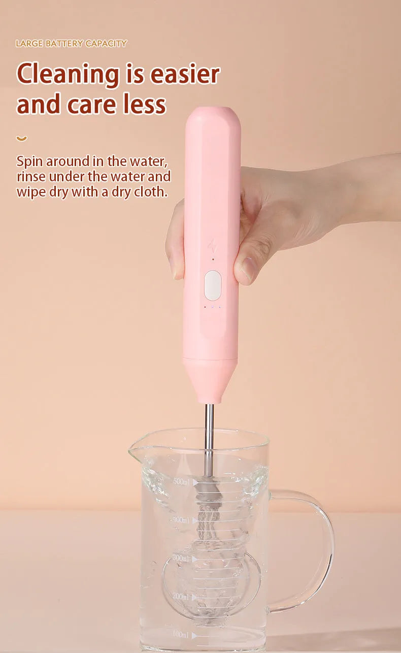 Hand-held electric whisk with straight handle, available in black colour options for household baking