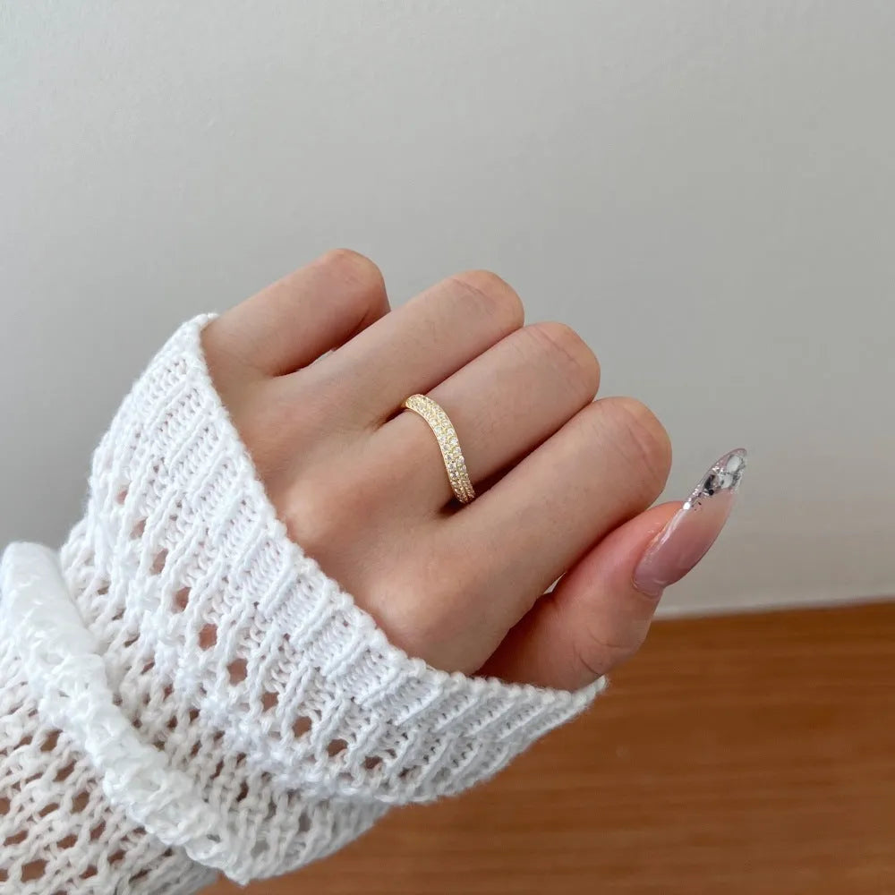 S925 sterling silver snake-shaped ring with zircon inlay, platinum electroplated finish on display