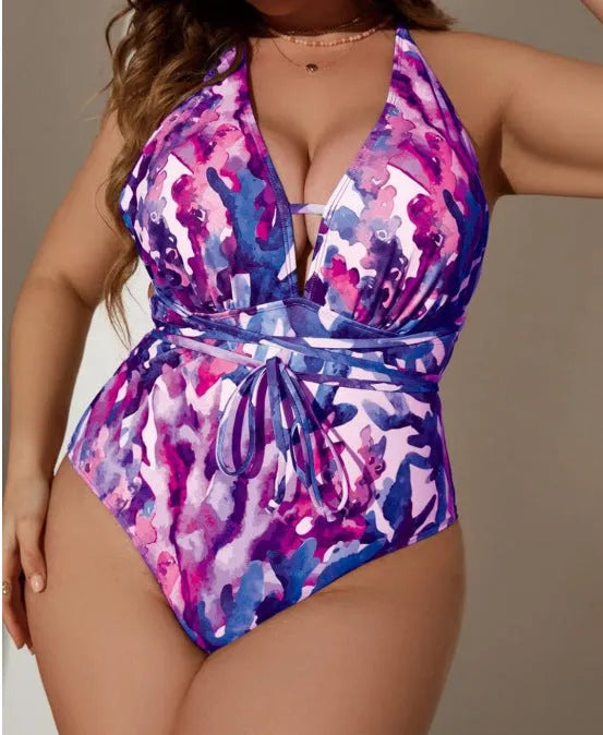 Blue or purple women's one-piece halter swimsuit for swimming sports.