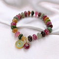Handmade natural stone bracelet with colourful tourmaline rabbit pendant and geometric round beads