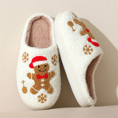 Cozy and stylish gingerbread and snowflake slippers with a plush, fuzzy exterior and non-slip sole for indoor wear