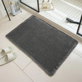 A square checkered pattern bathroom carpet with a non-slip backing in a neutral colour.