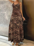 Dark brown leopard print women's dress with round neck, sleeveless design, and long hip skirt.