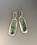Geometric two-colour marble pattern alloy drop earrings showing marbled surface detail
