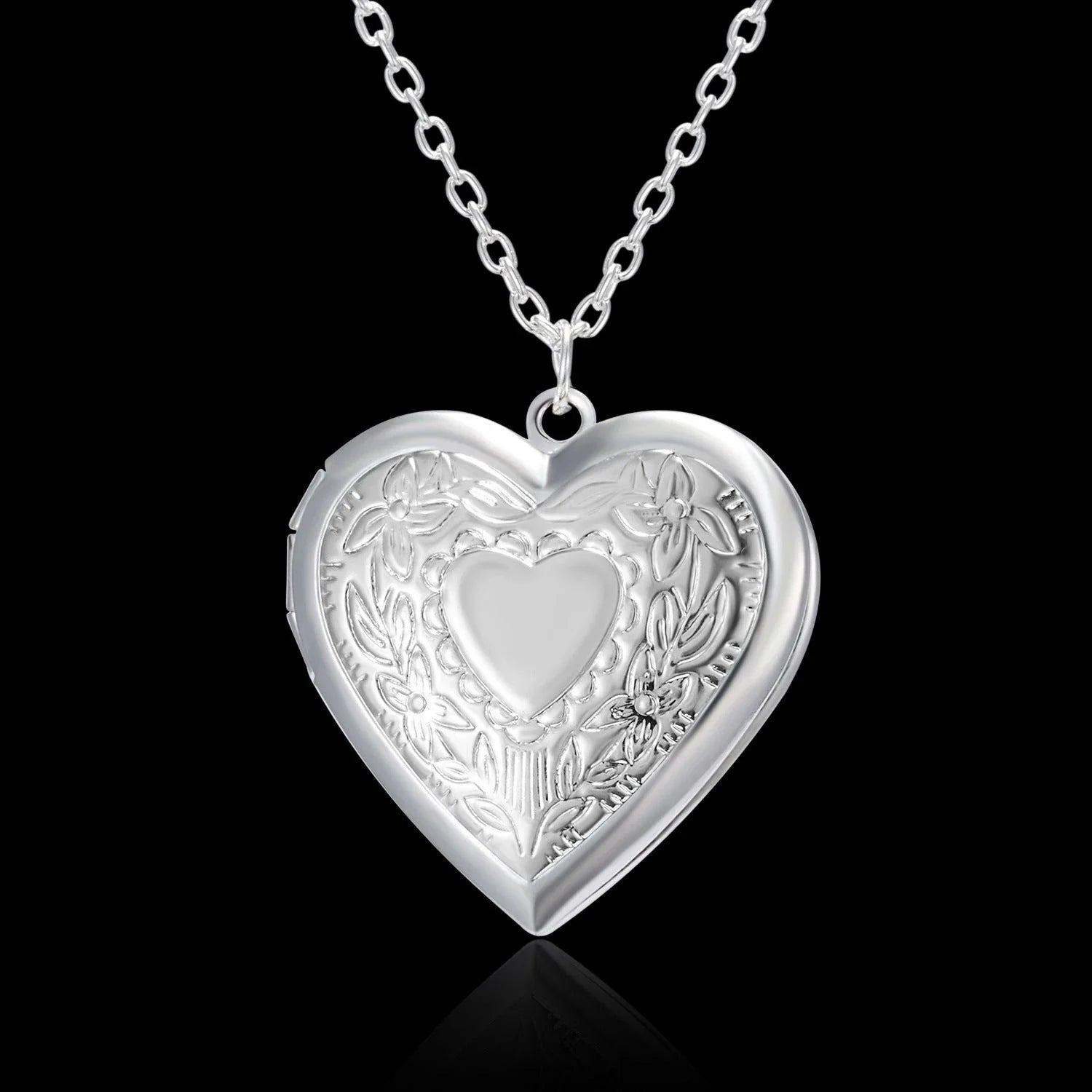 Personalized heart-shaped photo frame necklace in various colors, featuring a unique carved design and a delicate frame to display cherished memories.