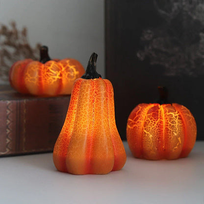 Enchanting resin pumpkin lanterns with realistic textures and LED candle illumination for Halloween decor and celebrations