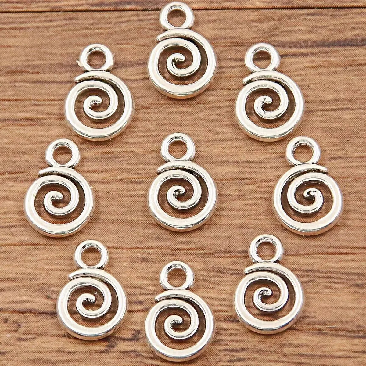 Double-sided hollow circle alloy pendant, electroplated round accessory in 7x11mm and 13x15mm sizes.