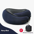 U-shaped navy blue travel neck pillow with memory foam, shown rolled up next to its carry bag.