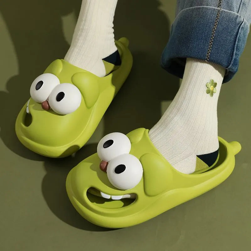 Pair of cartoon big eye dog PVC slippers for women in green colour