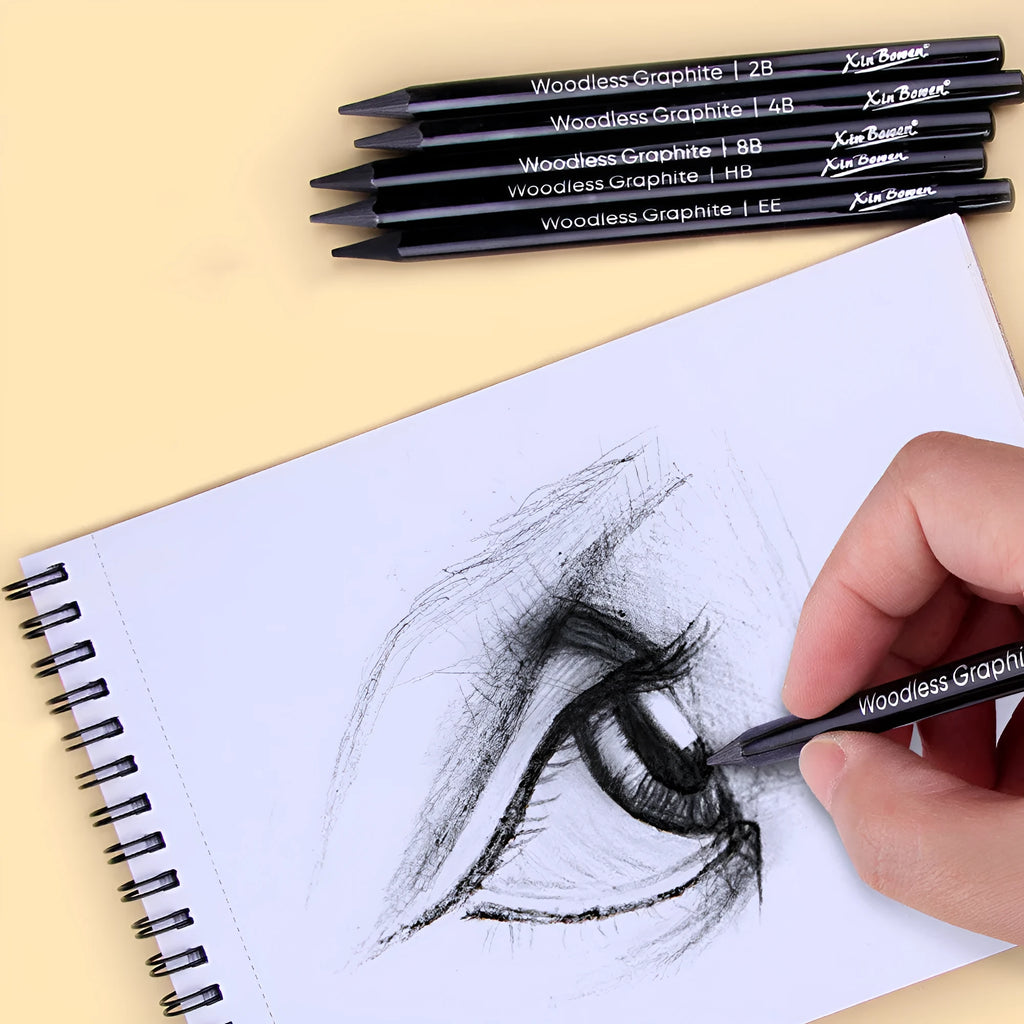 Set of six wood-free graphite full lead sketching pencils in a range of grades from HB to EE.