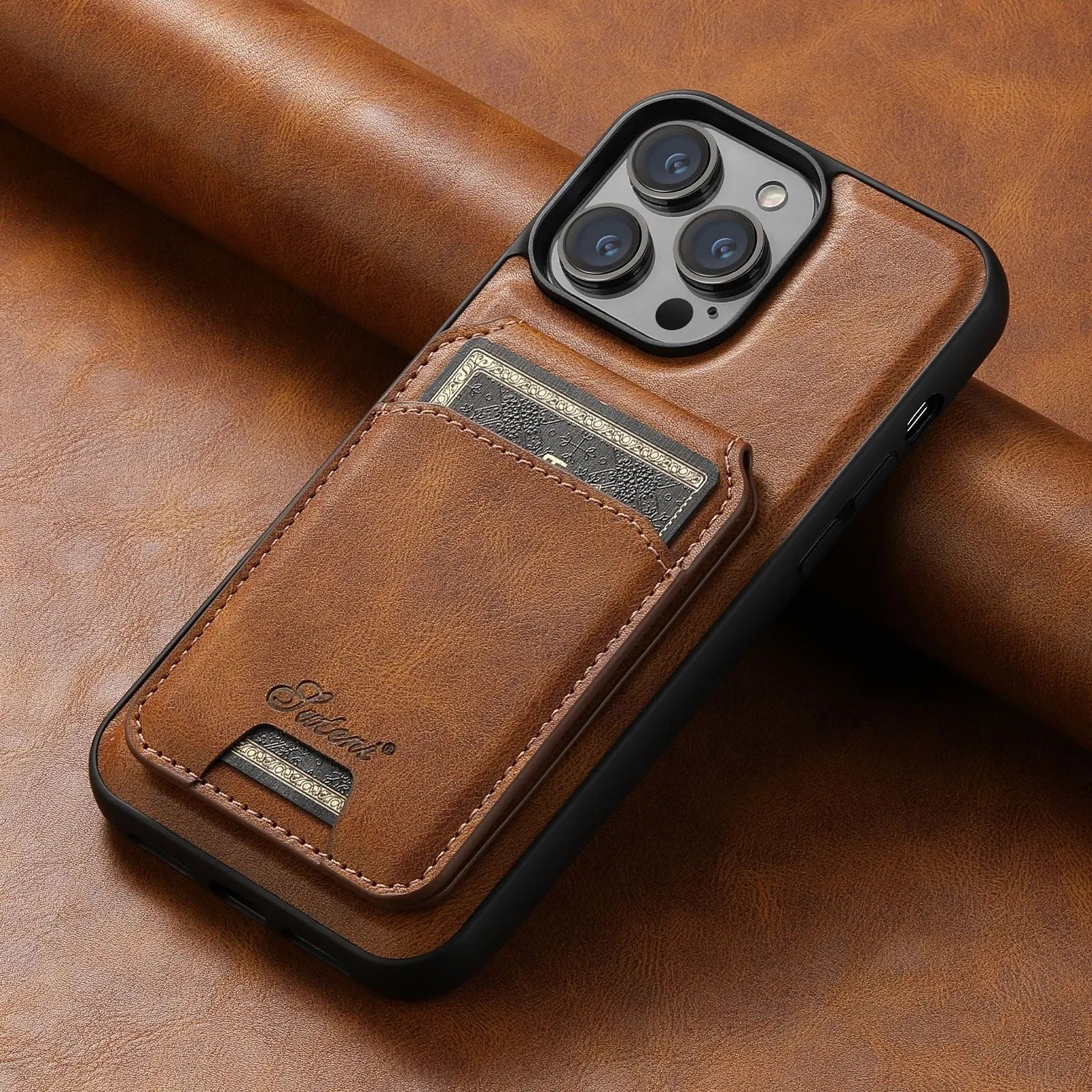 Black silicone Magsafe iPhone case with built-in rear card holder and oil wax pattern finish.