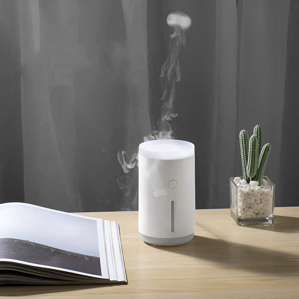 Spitting Circle humidifier in porcelain white with large fog output and dual atomisation modes for desktop use
